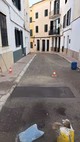 (Fotos) Reparan el bache del Carrer des Negres de Maó