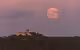 La Luna llena de la cosecha embellece el puerto de Maó