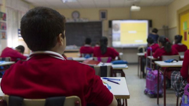 Alumnos en un aula.